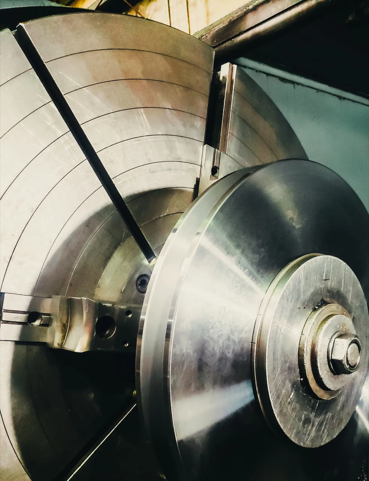 Large crane wheel being turned on CNC lathe at UTEC Industrial