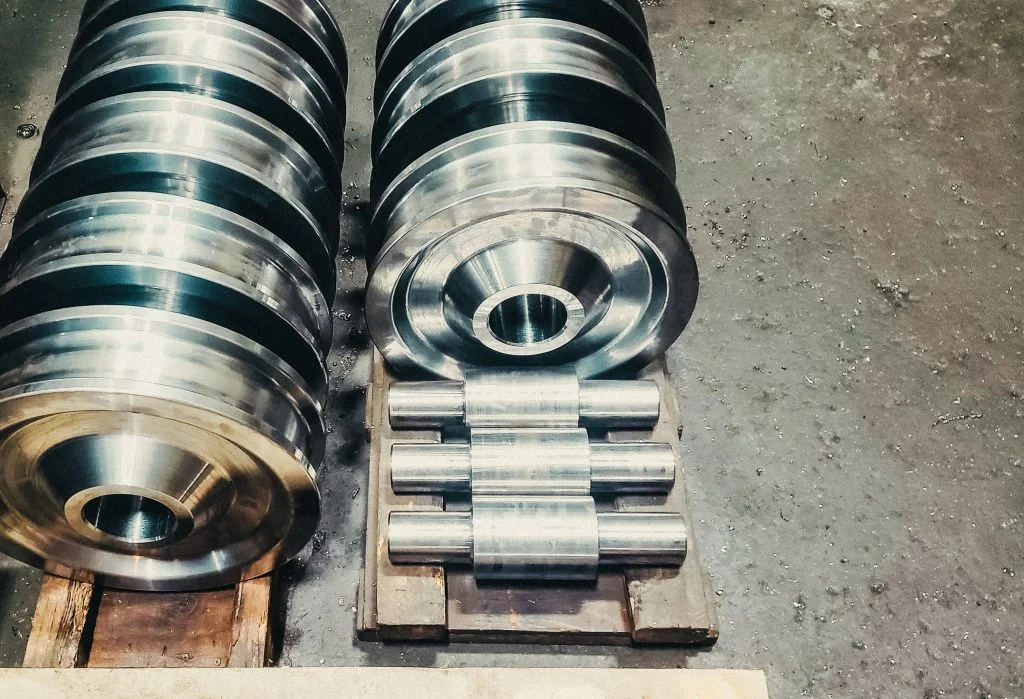 Crane wheel being precision-machined on CNC lathe at UTEC Industrial
